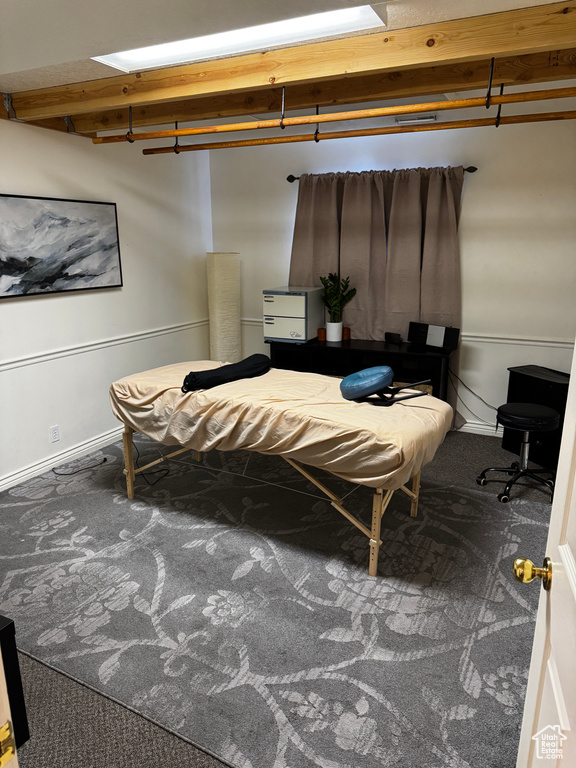 Bedroom featuring carpet flooring