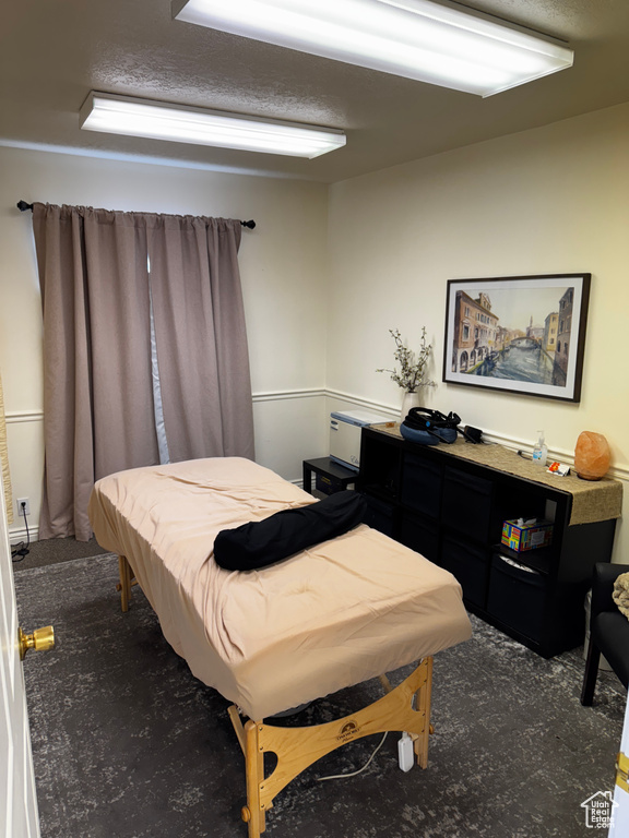 Bedroom featuring carpet flooring