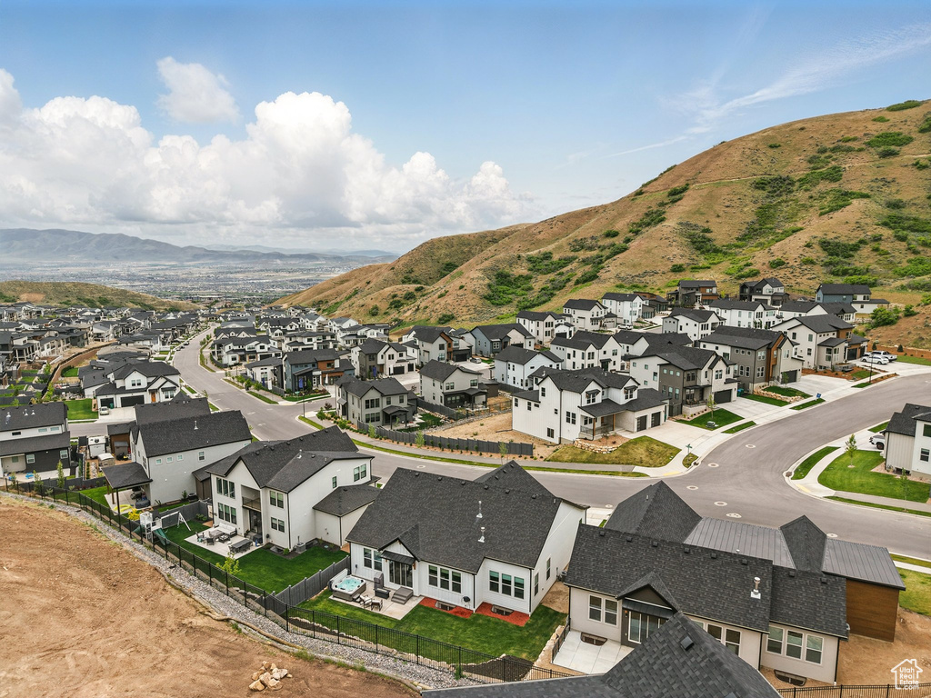 Aerial view of residential area with a mountainous background