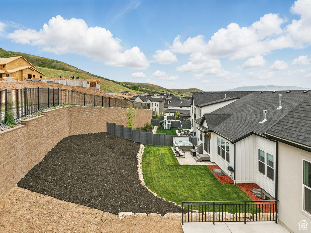 View of yard with a patio, a residential view, and outdoor lounge area