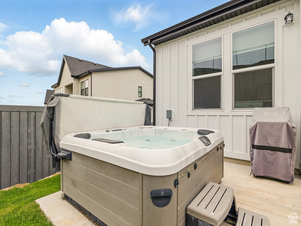 Deck featuring a hot tub