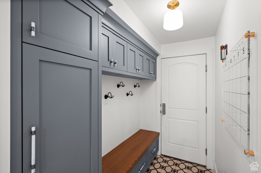 Mudroom featuring tile patterned floors