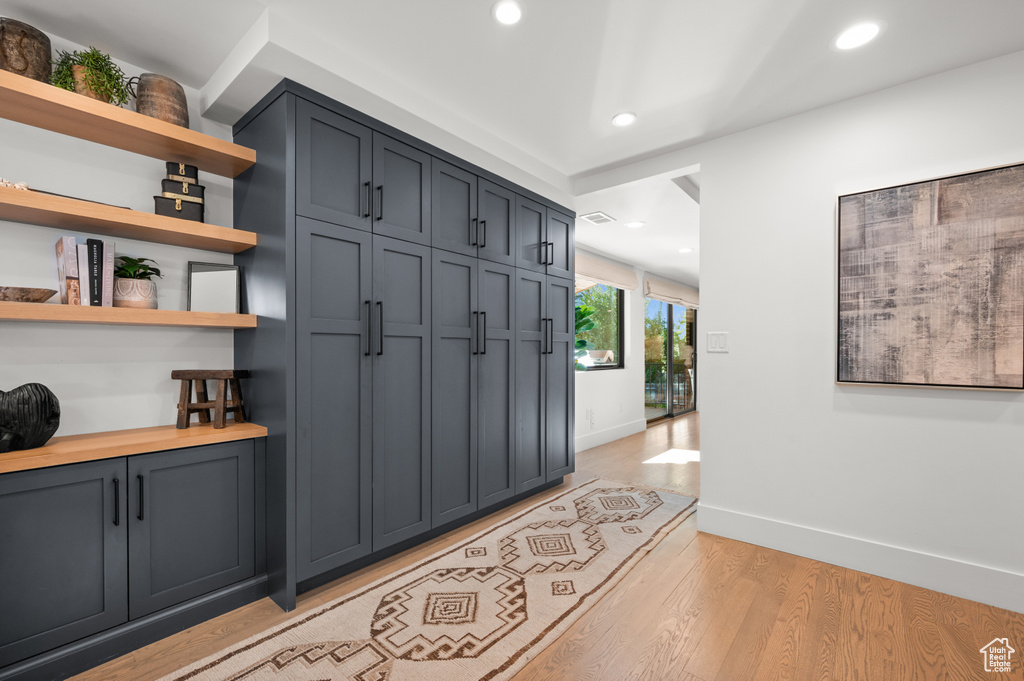Entrance foyer featuring recessed lighting, light wood-type flooring, and baseboards