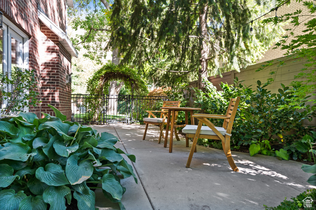 View of patio / terrace with outdoor dining area and a fenced backyard