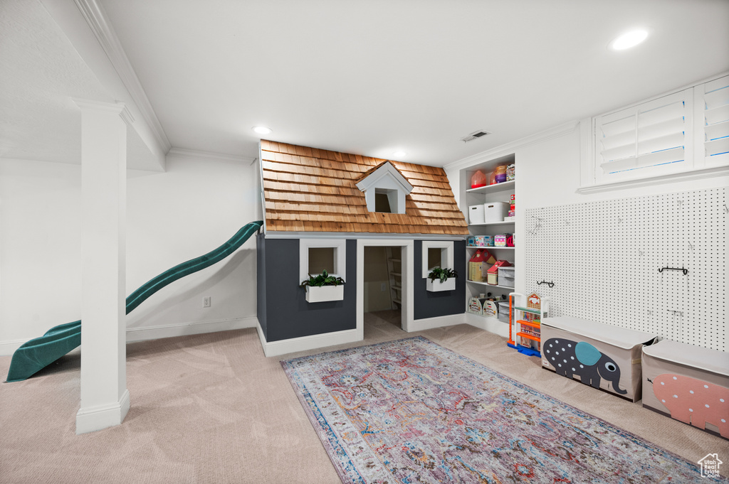 Rec room with visible vents, baseboards, carpet, ornamental molding, and recessed lighting