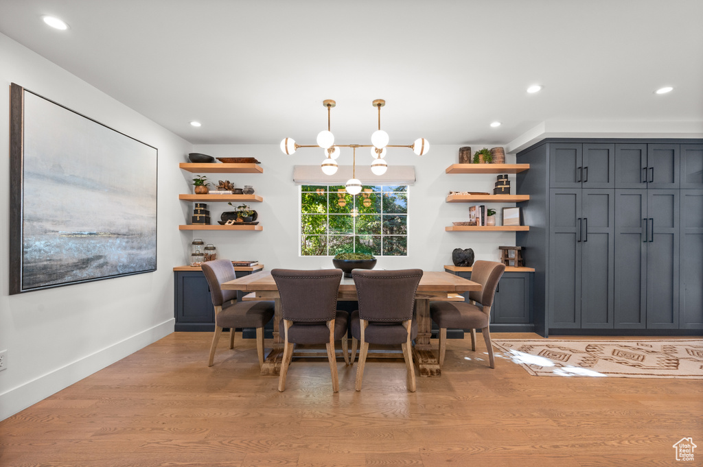 Dining space with recessed lighting, baseboards, and light wood-style flooring