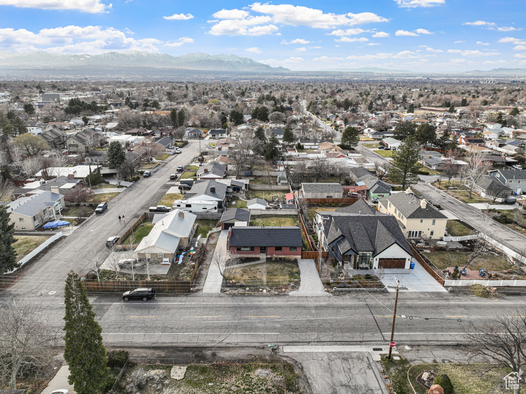 Drone / aerial view featuring a mountain view and a residential view
