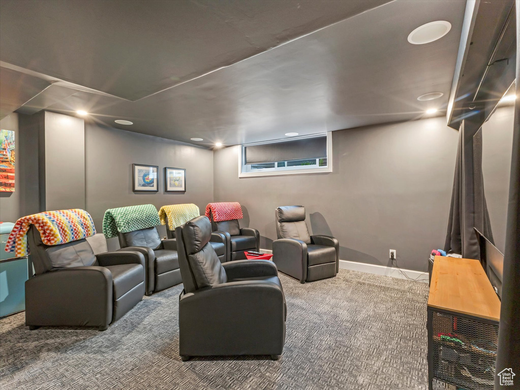 Home theater room featuring carpet floors