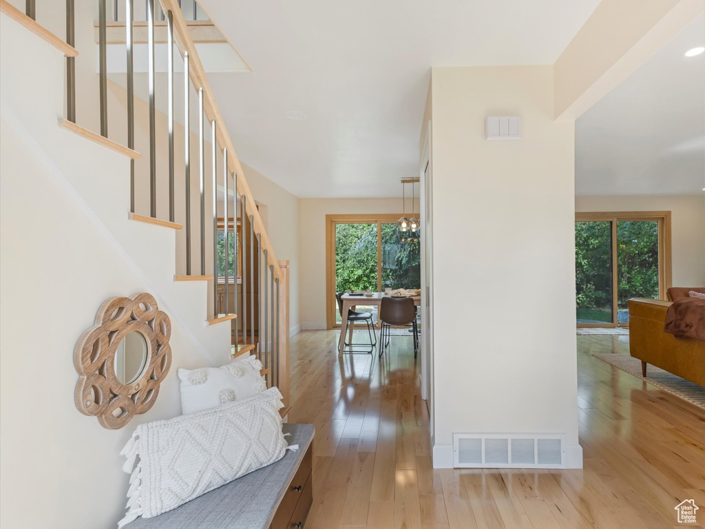 Entryway with light hardwood / wood-style flooring