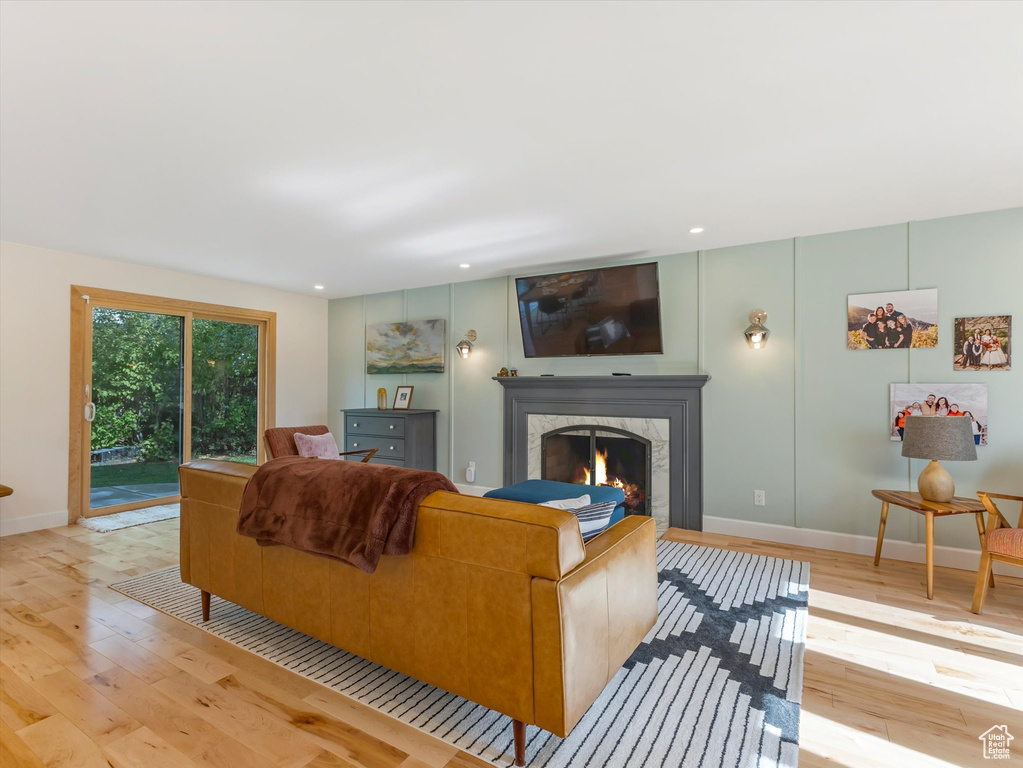 Living room with light wood-type flooring