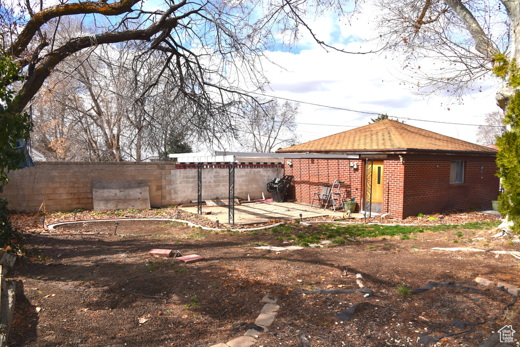 View of yard featuring a patio