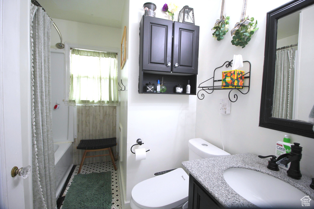 Bathroom featuring toilet and vanity