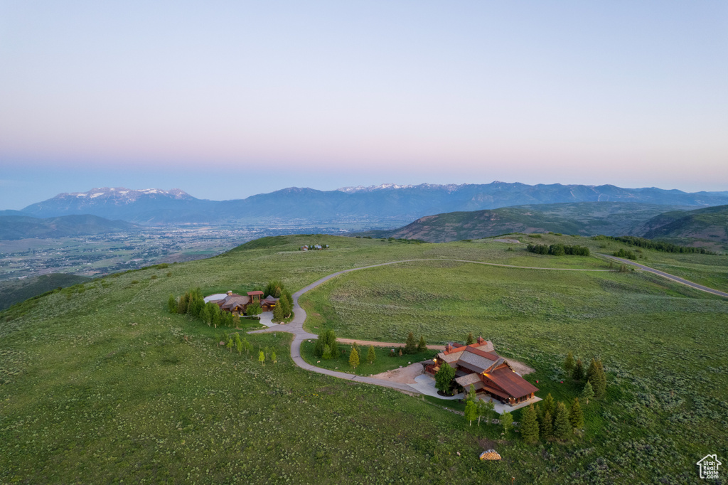 Aerial view of property\'s location featuring mountains and rural landscape