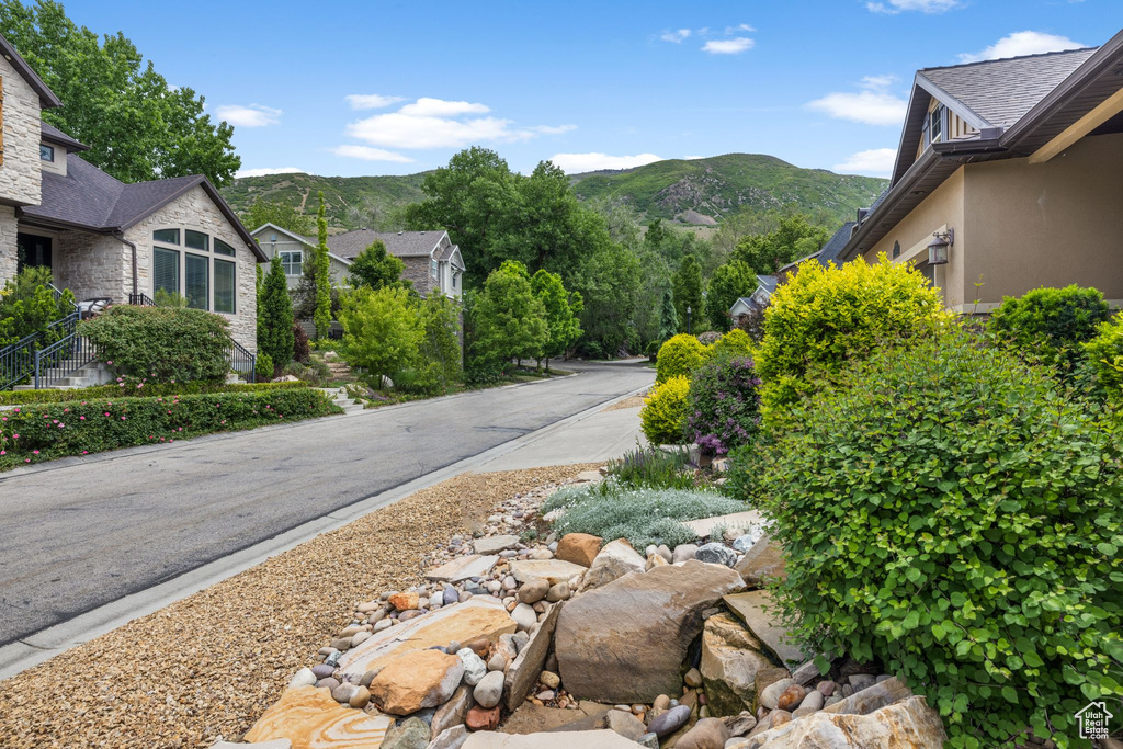 View of asphalt street with a mountain view