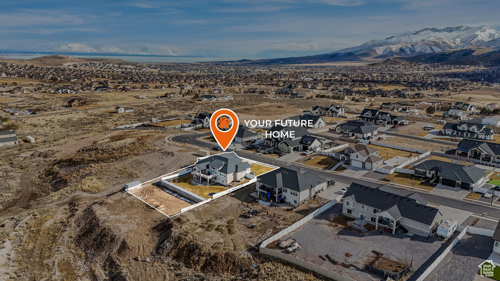 Birds eye view of property featuring a residential view and a mountain view