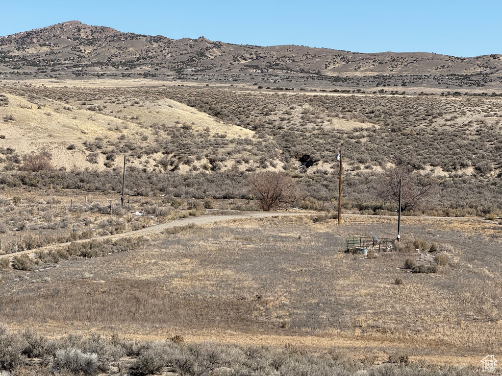 View of mountain feature with a rural view and view of desert