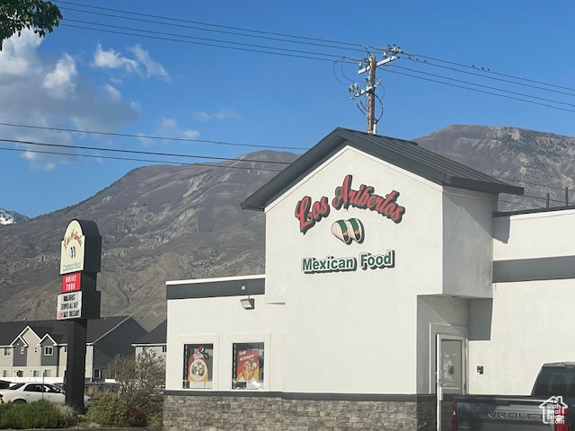 Details with stucco siding and a mountain view