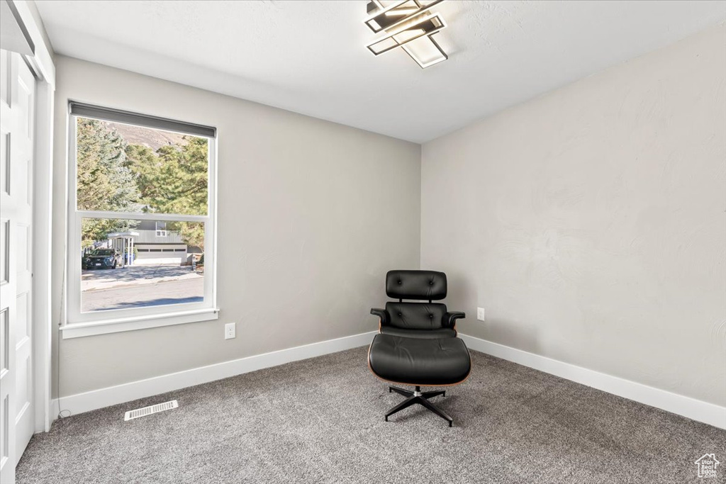 Unfurnished room with visible vents, baseboards, and carpet floors