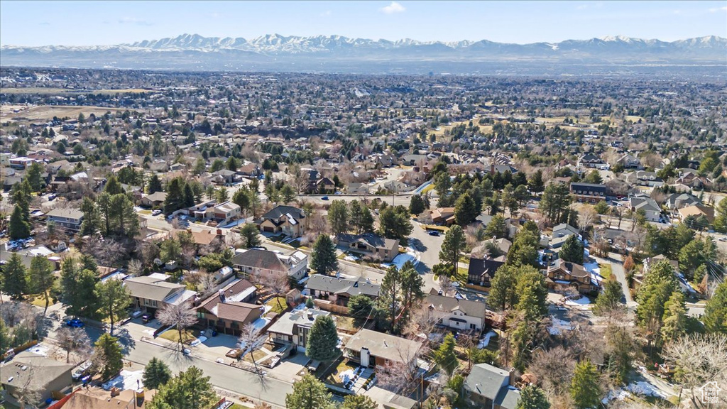 Aerial view featuring a mountain view and a residential view