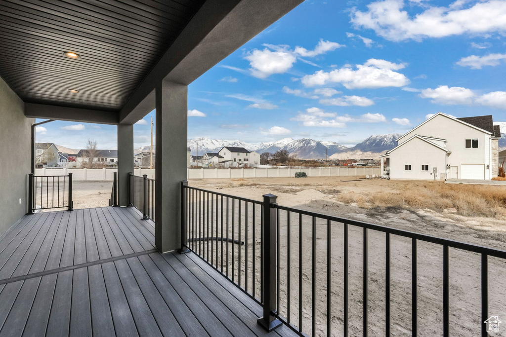 Balcony with a mountain view and a residential view