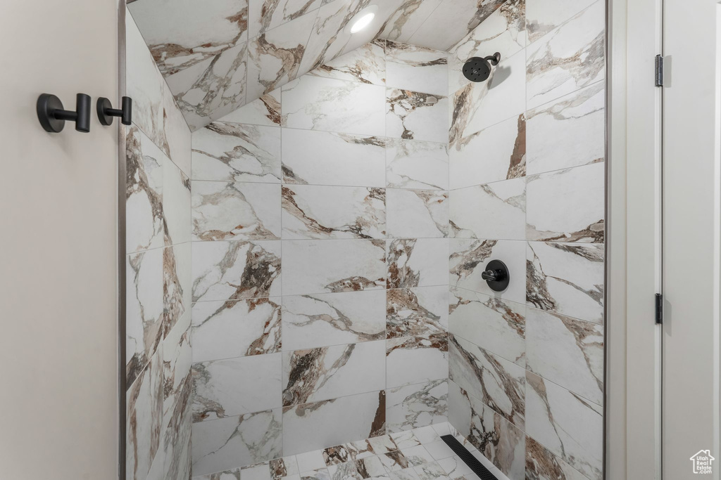 Interior details featuring tiled shower