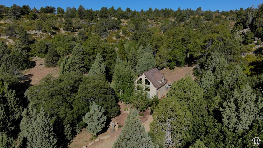 Bird\'s eye view featuring a wooded view