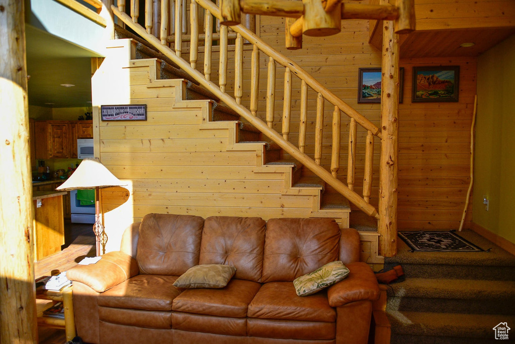 Staircase with wood walls