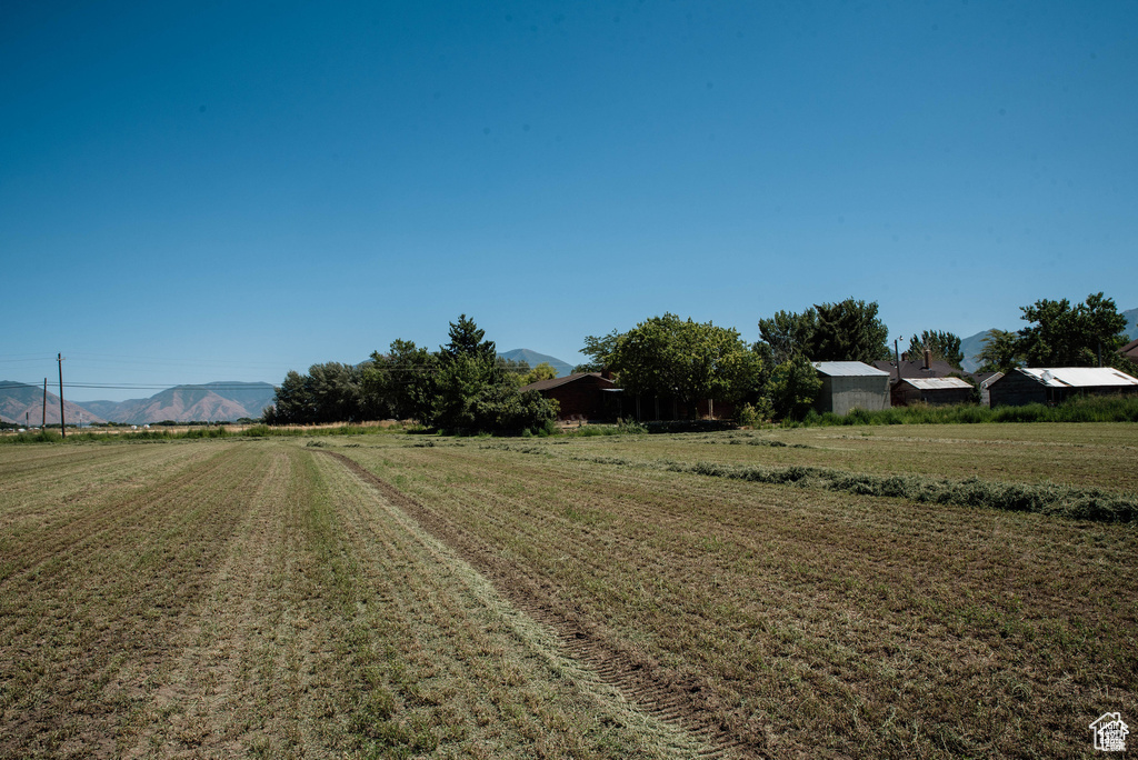 View of road featuring a rural view and a mountain view