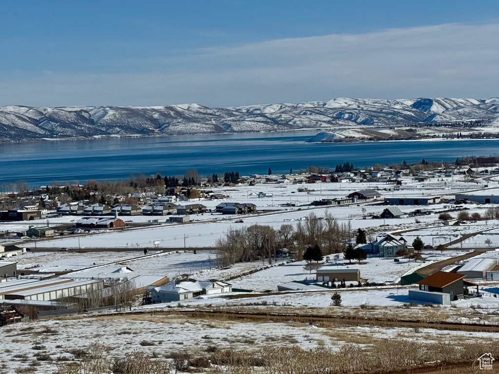 Mountain view featuring a water view