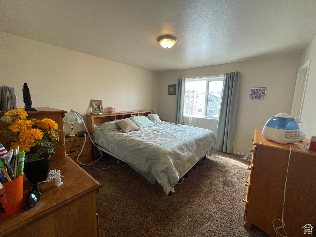 Bedroom featuring carpet flooring