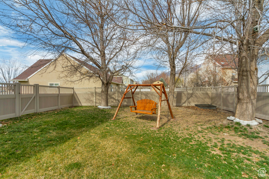 View of yard with a fenced backyard