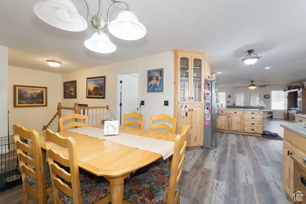 Dining space with light wood-style floors
