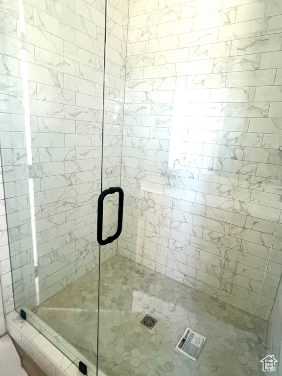 Full bath featuring a stall shower