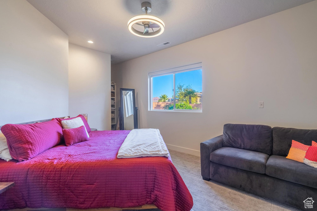 Bedroom with recessed lighting, carpet flooring, visible vents, and baseboards