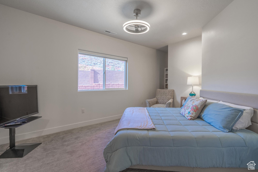 Bedroom featuring recessed lighting, baseboards, visible vents, and carpet floors