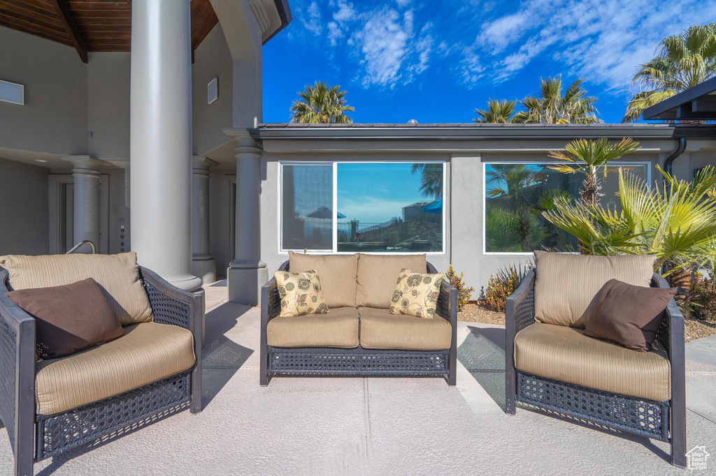 View of patio featuring an outdoor hangout area