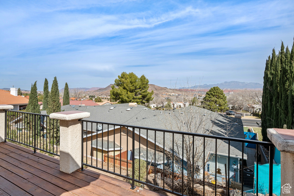 Wooden deck featuring a mountain view