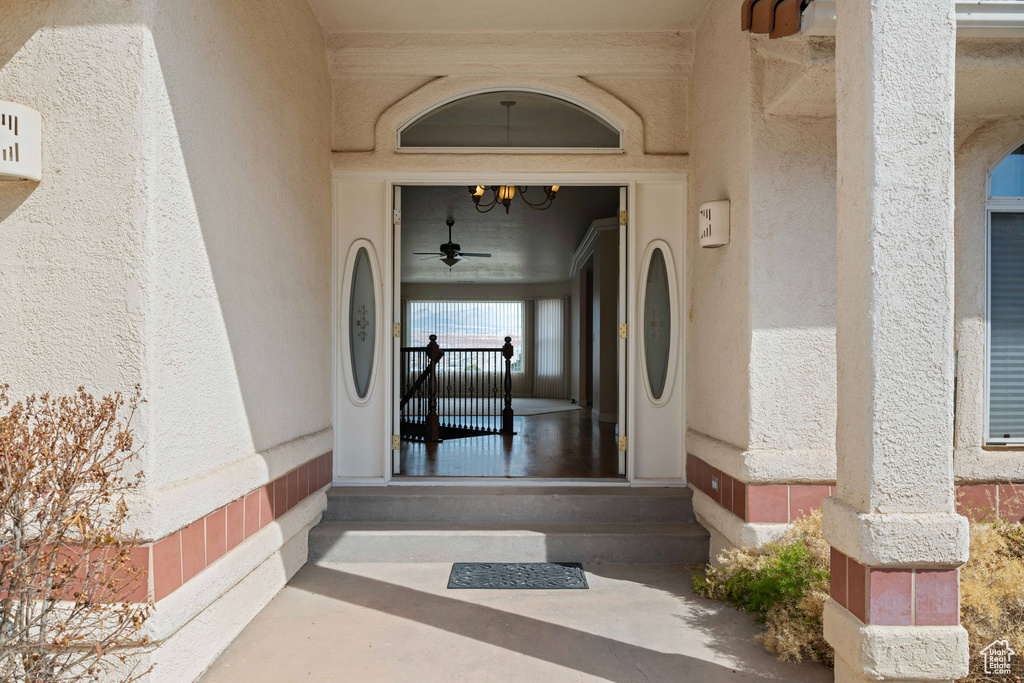Property entrance featuring stucco siding