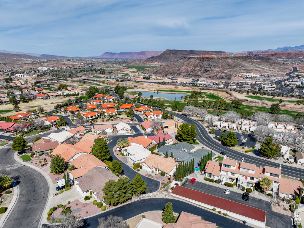 Drone / aerial view featuring a residential view and a water and mountain view