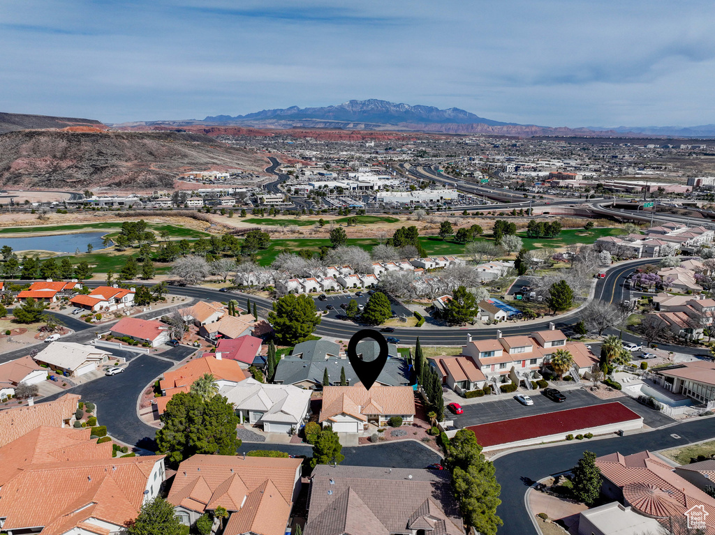 Aerial view featuring a residential view and a water and mountain view