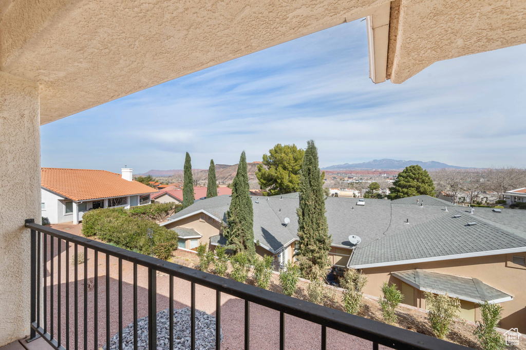 Balcony with a mountain view and a residential view