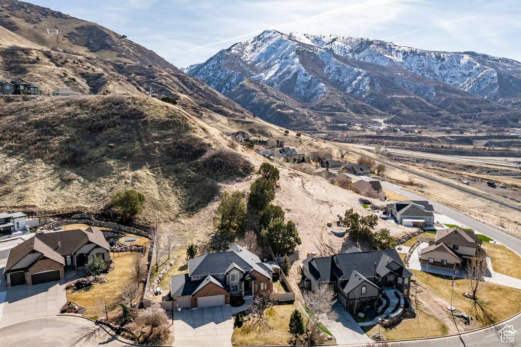 View of mountain background featuring nearby suburban area