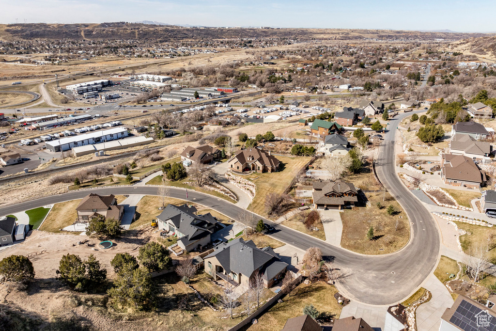 Aerial overview of property's location featuring nearby suburban area