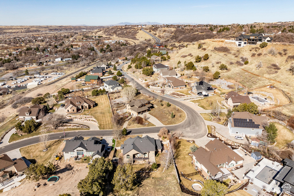 Aerial view of property's location featuring nearby suburban area