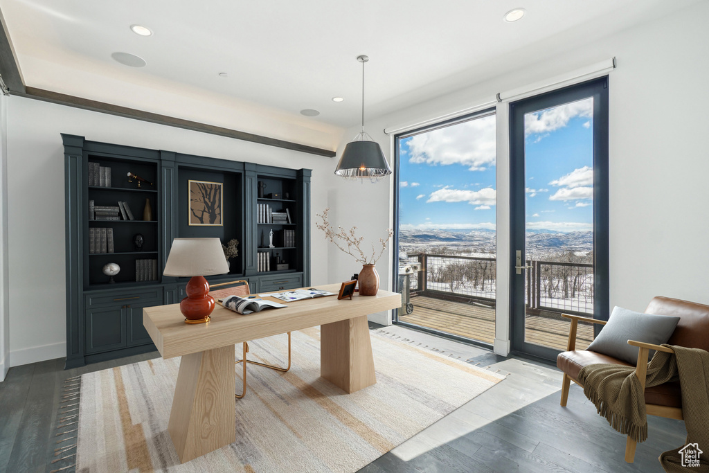 Office area with wood finished floors, recessed lighting, and baseboards