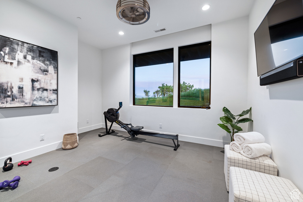 Workout area featuring recessed lighting, baseboards, and carpet flooring