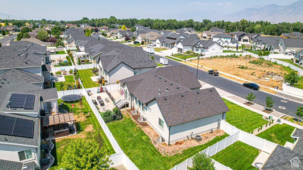 Birds eye view of property with a residential view