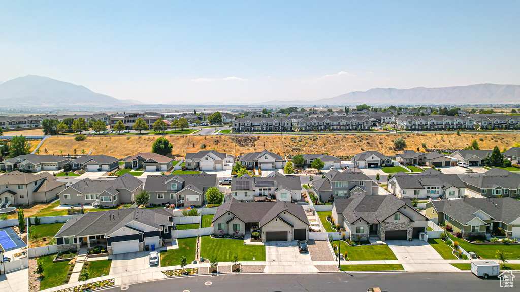 Drone / aerial view with a mountain view and a residential view