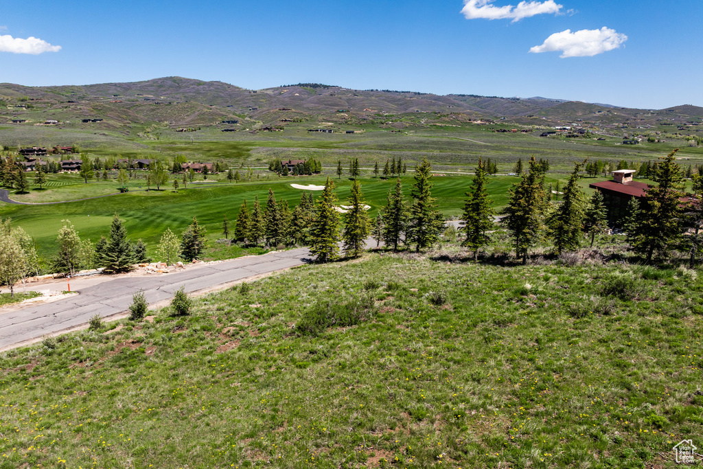 View of mountain backdrop featuring a golf club