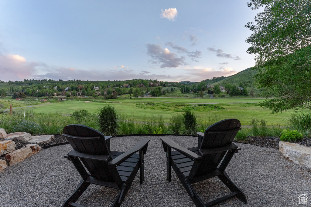 View of patio / terrace featuring a mountain view and an outdoor fire pit